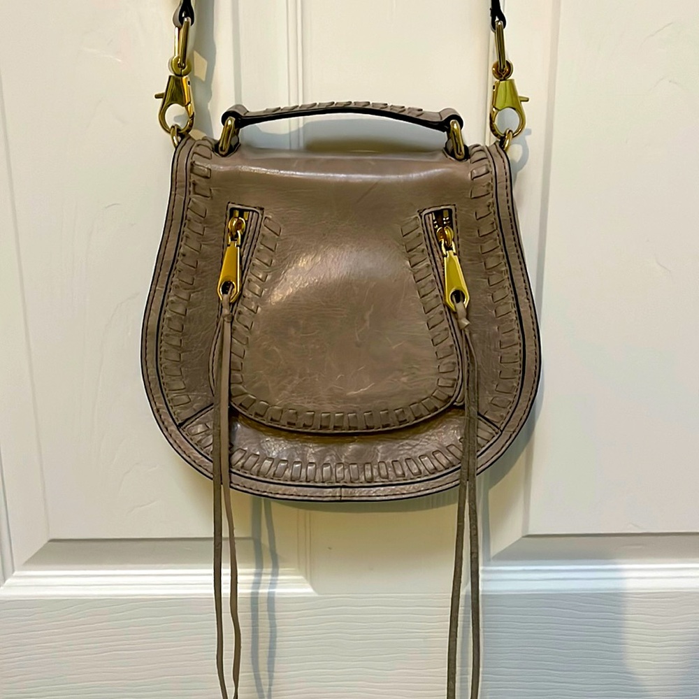 Rebecca Minkoff all leather crossbody bag with whip stitching.